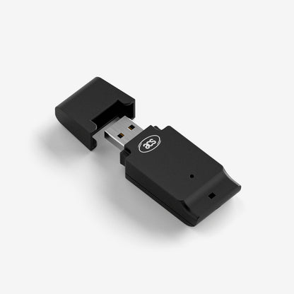 A SIM card reader photographed from above at a slight angle