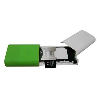 A SIM card reader with the cover removed, showing the inserted SIM card