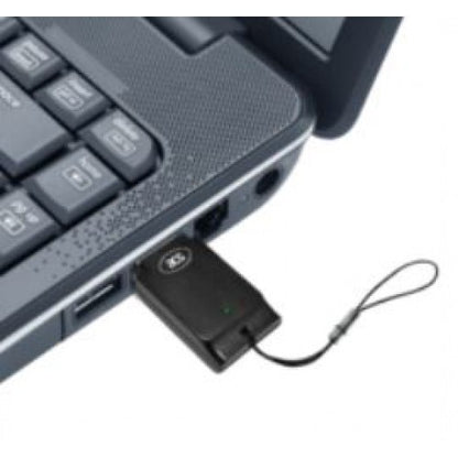 A SIM card reader inserted into a laptop